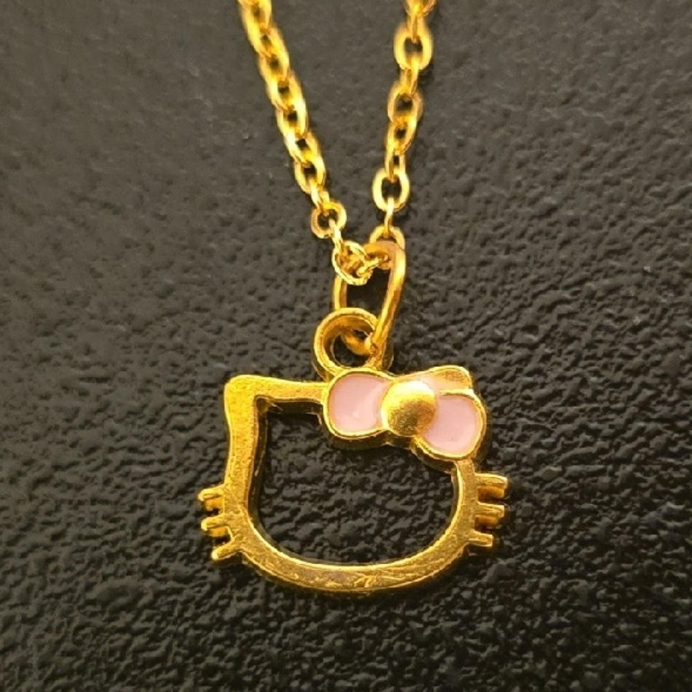 Gold tone Hello Kitty Necklace Colored Bow